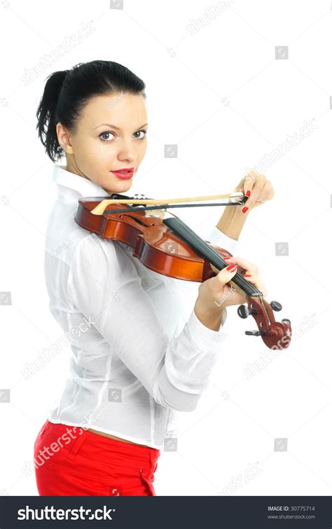 Portrait Of A Pretty Young Woman Playing The Violin Stock Photo