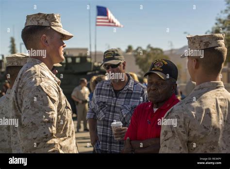 Marines With 3rd Battalion 11th Marine Regiment Talk With Local