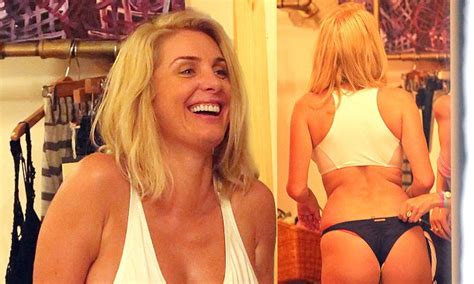 Zilda Williams Breaks Into Fits Of Giggles As She Flaunts Pert Derriere