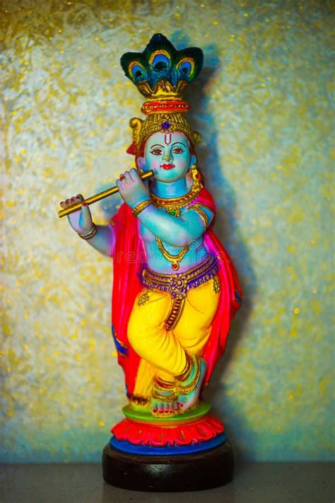 Colorful Figure Of The Hindu God Krishna Playing The Flute Lord