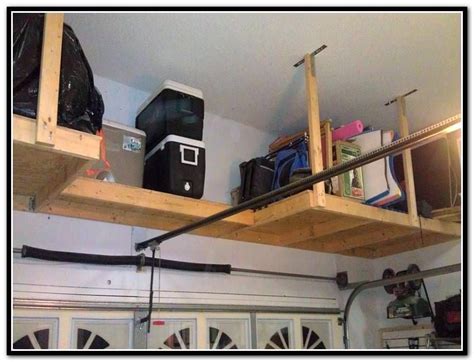 One of the first projects i tackle in a new home is adding overhead garage shelving. Garage Overhead Storage Diy Wood | Overhead garage storage ...