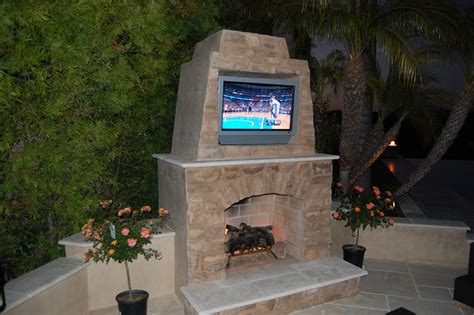 Outfit your outdoor living room with this striking stacked stone outdoor fireplace or create a beautiful outdoor stacked stone kitchen centered around the grill island or outdoor brick oven components. Wood Burning Fireplace | Propane Fireplace | Portable Fire Pit