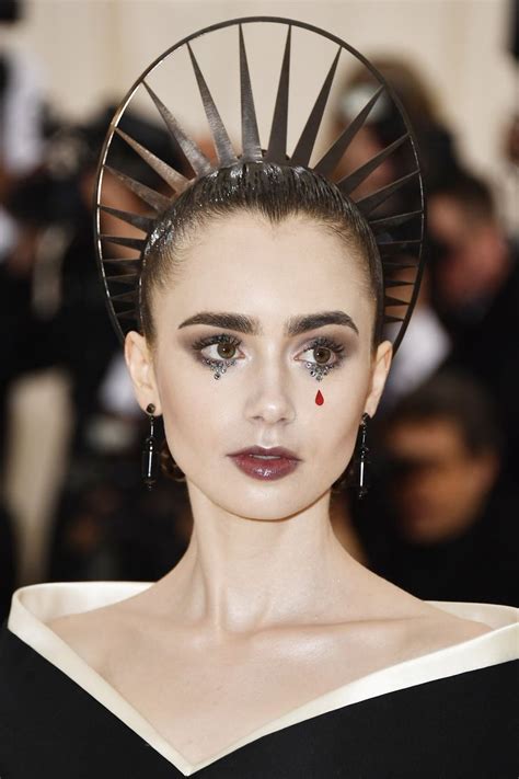 lily collins s met gala makeup is a sneaky tribute to the dark arts