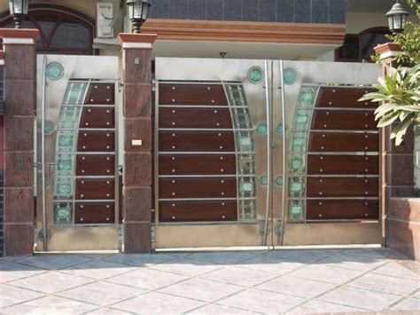 Mar 25, 2019 · 15. Stainless Steel Gate Designs with Glass, SS Gate - Sky ...