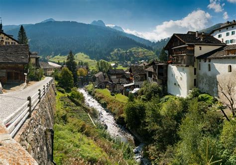 Picturesque Mountain Village With White Stone Houses And Stone Roofs In
