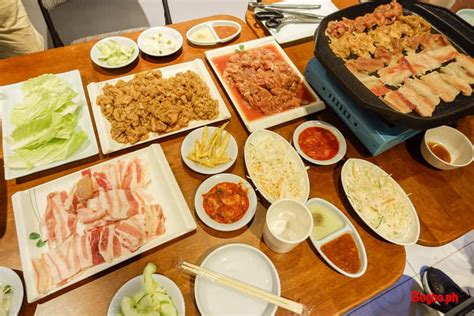 At every kkoki bbq place, all of your party gathers around a grill in the middle of the table. Migag Korean BBQ: ₱289 UNLI Samgyeopsal at APM Mall in Cebu City | Sugbo.ph - Cebu