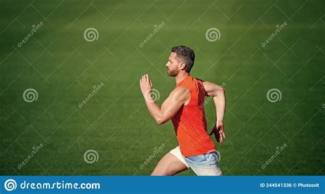 Energetic Man On Running Track Sporty Runner Stamina Sport And