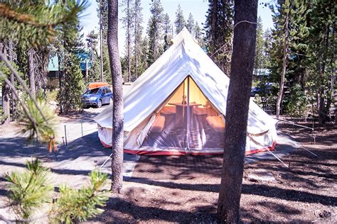 Your private cabin sits in a large meadow bordering elk lake, surrounded by mountains and abundant wildlife. Elk Lake Resort | Glamping Tents