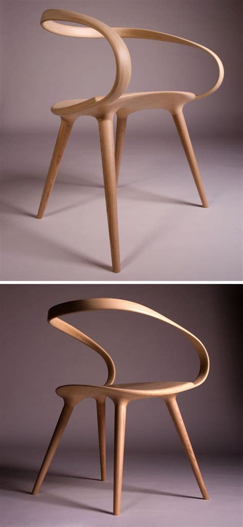 This Flowing Curved Wooden Armchair Was Designed By Jan Waterston