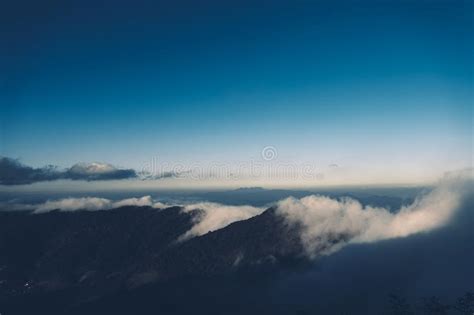 Evening Light Sky And Fog On The Mountain In The Evening Stock Photo