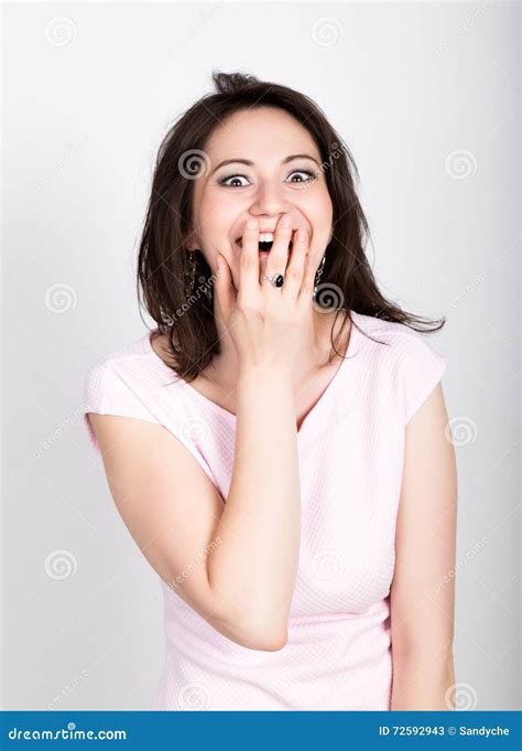 Close Up Portrait Happy Young Beautiful Brunette Woman Closes Mouth By Hand Shocked Surprised