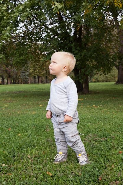 Premium Photo Little Baby Boy Walking In Park Outdoor
