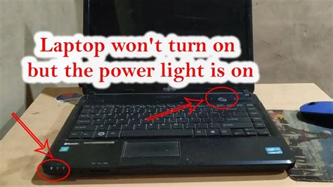 hp laptop not turning on but charging light