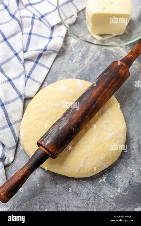 Dough Is Rolled Out With Rolling Pin For The Dough Stock Photo Alamy