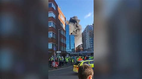 reading fire crane operator rescues worker next to burning high rise bbc news