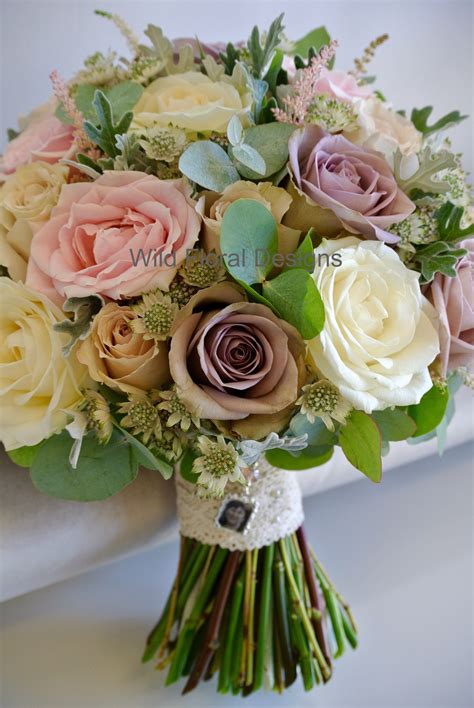 vintage brides bouquet amnesia roses avalanche roses astilbe and dusty miller bridesmaid