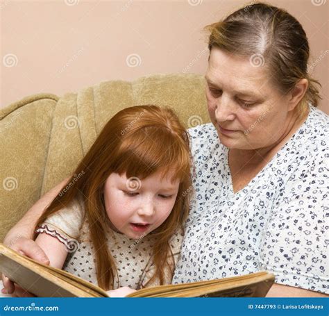 Grandmother And Granddaughter Read The Book Stock Image Image Of