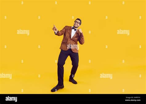 Happy Cheerful Young Black Guy In Party Jacket Dancing Isolated On