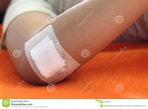 The dressing in contact with the. Wound Sealed With Plaster Stock Image - Image: 27905751