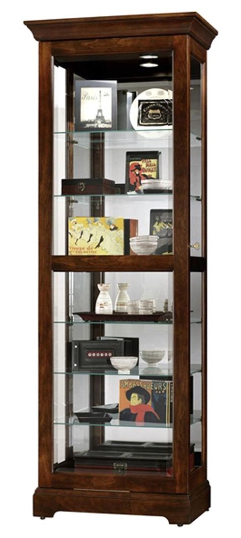 Display cabinet featuring lighting, glass door and appealing , modern design. This Display Cabinet Includes Six Glass Shelves with ...