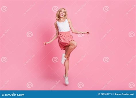full length body size view of attractive cheerful thin girl jumping having fun isolated over