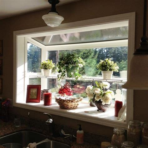 Replace a sunny kitchen window with a window greenhouse to keep your flowering house plants, herbs and. Amazing Ideas About Greenhouse Windows Kitchen | Kitchen ...