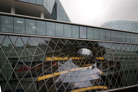 Funneled Glass Void Creates Vertical City In Myzeil Shopping Mall
