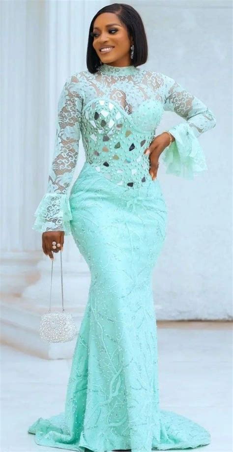 Pin By Bella Dotsey On élégante Lace Dress Styles African Design Dresses Lace Gown Styles