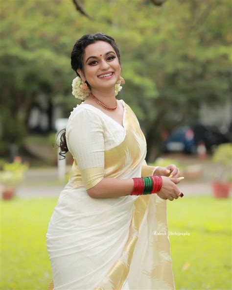 Malayalam Actress Lakshmi Nakshathra In Kasavu Saree Hot Photos Exposing Very Hot Photos