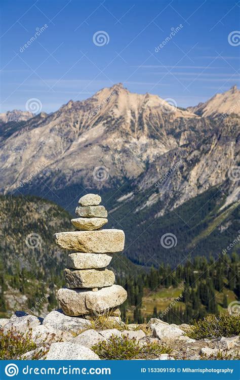 Stack Of Stones Rocks Trail Marker Cairn In The Mountains North