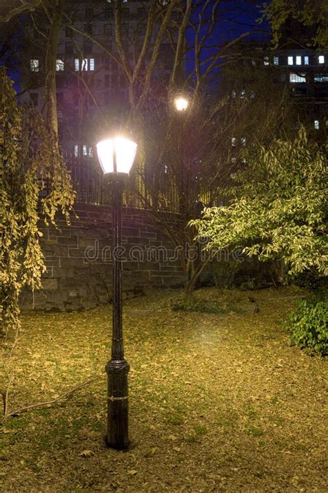 Old Fashioned Street Lamp In A Public Park At Night On Manhattan S