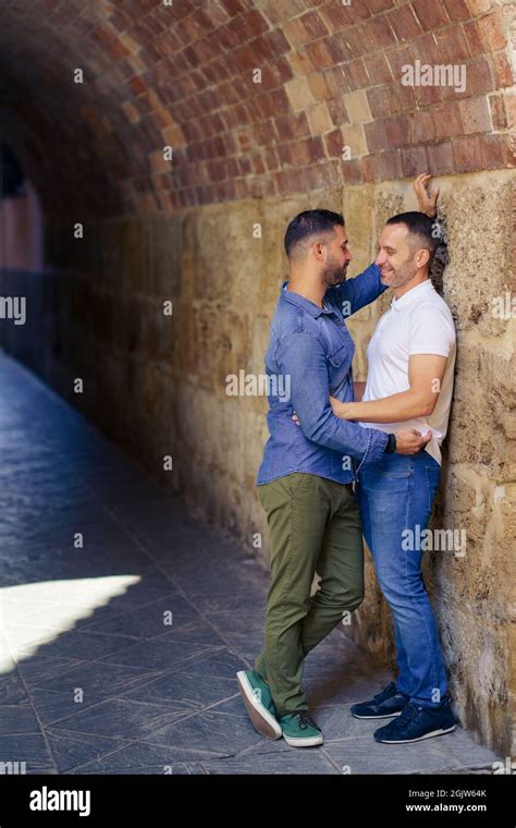 Gay Couple Hugging In A Romantic Moment Outdoors Stock Photo Alamy