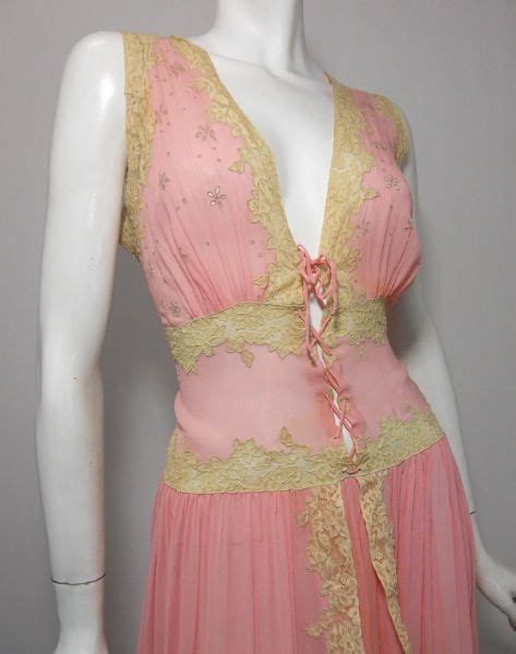 pink silk 1940s nightgown with ecru lace trim and corset lace center to waist lace trimmed