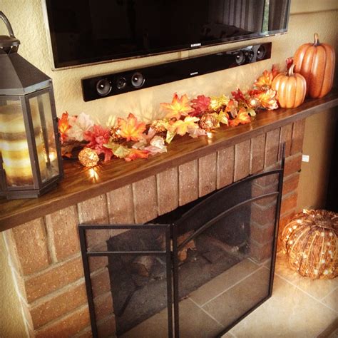 Fall mantle... I want the glowing pumpkin in the corner! | Fall mantle, Thanksgiving mantle ...