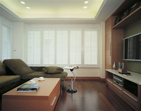 Then, to save a little, they will use wood. Living Room Shutters | Plantation Shutters | Full Height ...