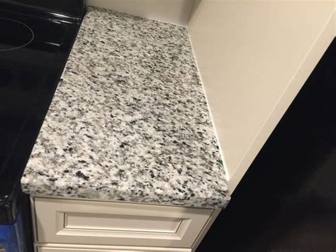 A bright white kitchen cabinet and a dark granite countertop can create a really dramatic look with shenandoah gloss white cabinets with silestone sierra madre countertops. EZ FAUX DÉCOR Self-Adhesive Waterproof Marble/Granite ...