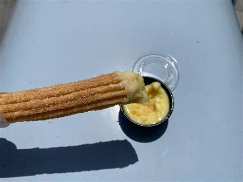 Review Pineapple Tres Leches Churro Is A Sweet Summer Snack At Disney