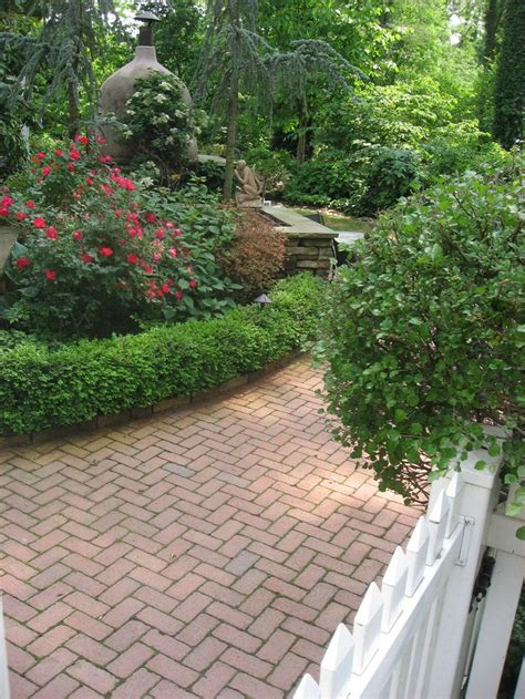 A brick driveway can be a unique feature for a home since materials come in a wide range of colors, sizes, shapes and textures. herringbone brick sidewalk www.midwestblock.com | DIY Stone Pavers | Pinterest | Best Sidewalk ...