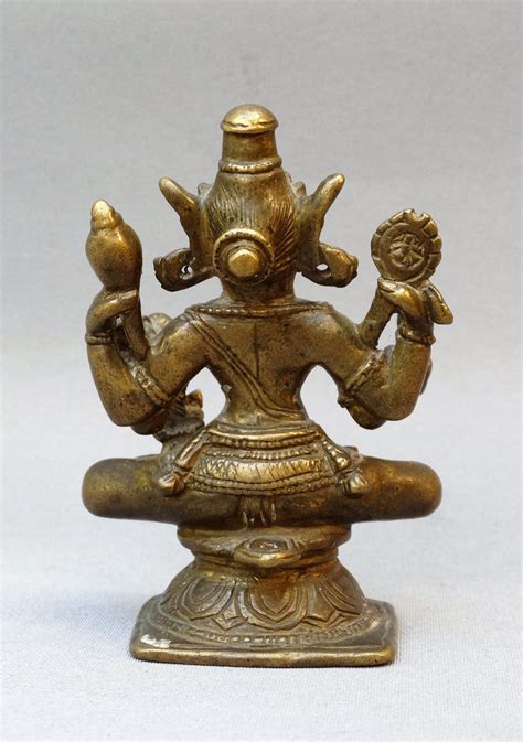 Seated Vishnu Astamangala