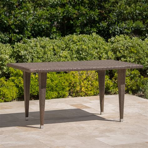The dark brown or grey webbing of the wicker combines with the beauty of the smooth amber table top to seamlessly enhance the natural beauty of your back yard. Dominica Outdoor Rectangular Wicker Dining Table - Walmart.com