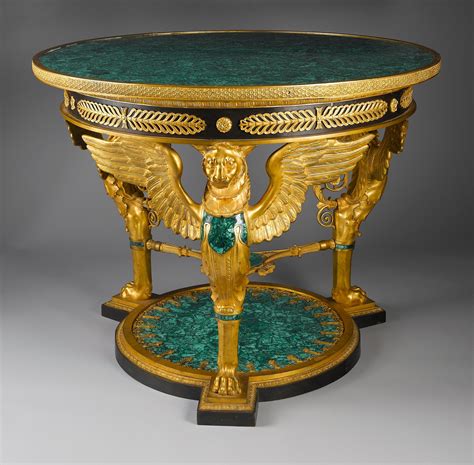 American styles of furniture have a few things in common: Empire-Style Gilt Bronze And Malachite Center Table ...