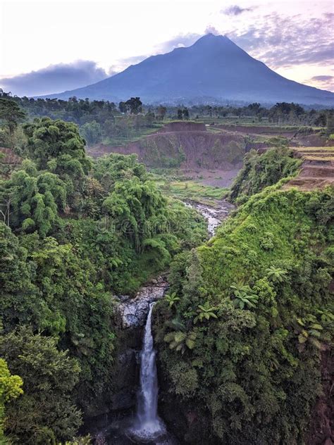 Kedung Kayang Waterfall And Merapi Mountain View Sunrise With Forest