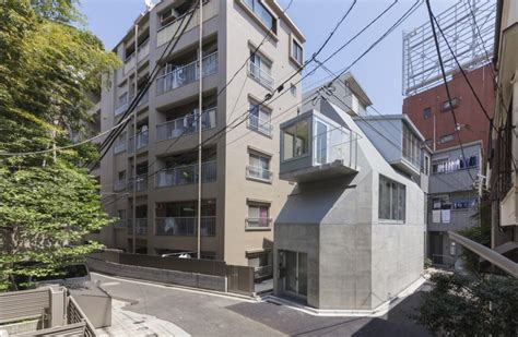 Small Tokyo House Is Surrounded By Medium And High Rise Buildings