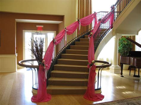 As we always say, there is never just one way to go about anything. This staircase with its elegant pink fabric swags provided ...