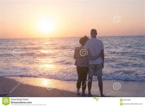 Coupleon On Beach Hugging And Admiring Sunset Stock Image Image Of Mood Sand 82915999