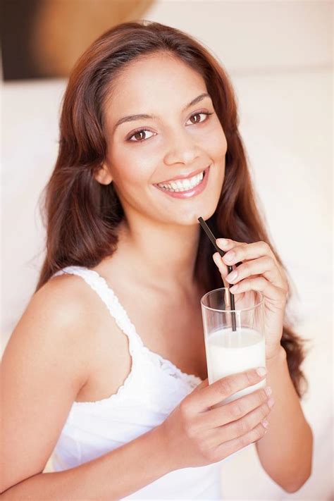 Woman Drinking Milk Photograph By Ian Hooton Science Photo Library Pixels