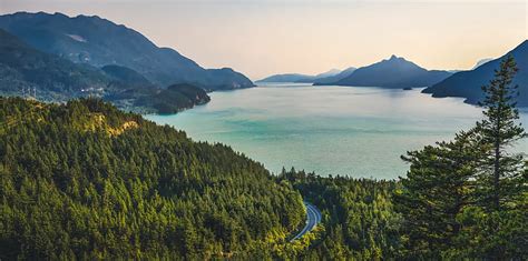 Royalty Free Photo Lake Surrounded By Mountains And Green Pine Trees