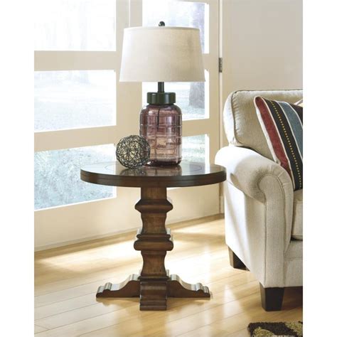 1furniture.space is your first and best source for all of the information you're looking for. T804-6 Ashley Furniture Gaylon Living Room Round End Table