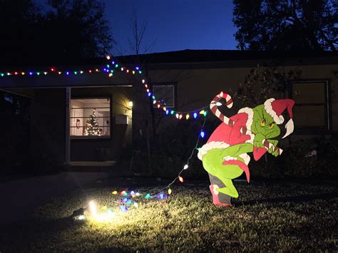 Grinch Stealing Christmas Lights Off House Decoratingspecial Com