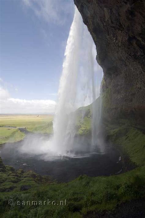 Behind The Seljalandsfoss Waterfall Near Vík In Iceland